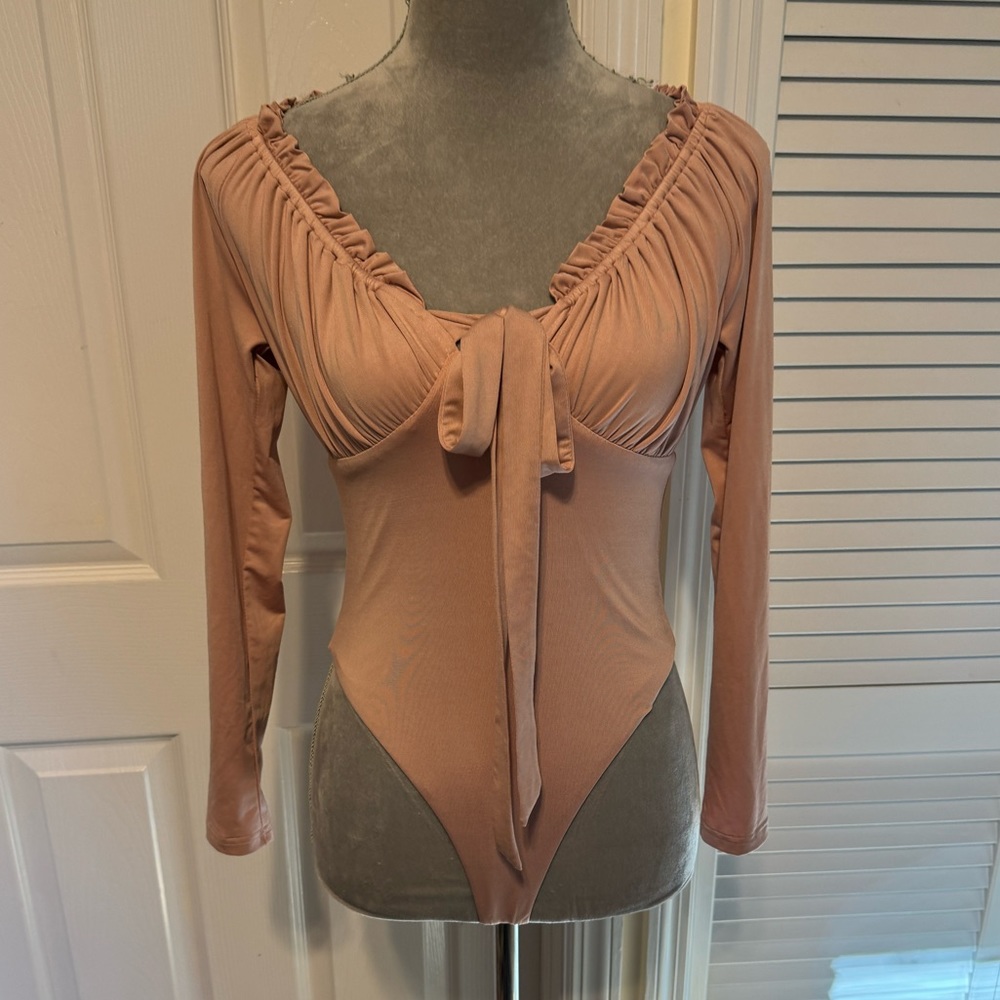 Fashion Nova Pale Pink Long Sleeve Ruffle Bodysuit